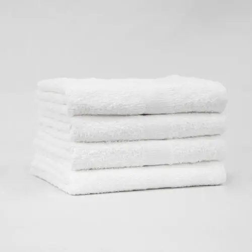 Stack of 16x27 Economy White Hand Towels
