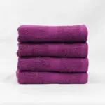 Stack of 16x27 Plum Gym Towels