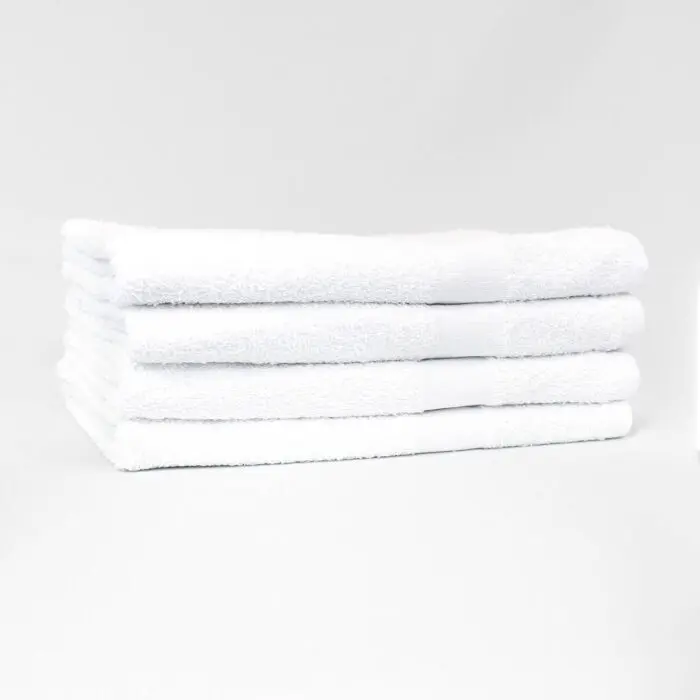 Stack of 24x48 Economy White Bath Shower Towels