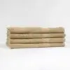 Stack of 24x50 Tan Locker Room Towels