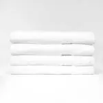 Stack of 30x60 Premium White Bath Towels