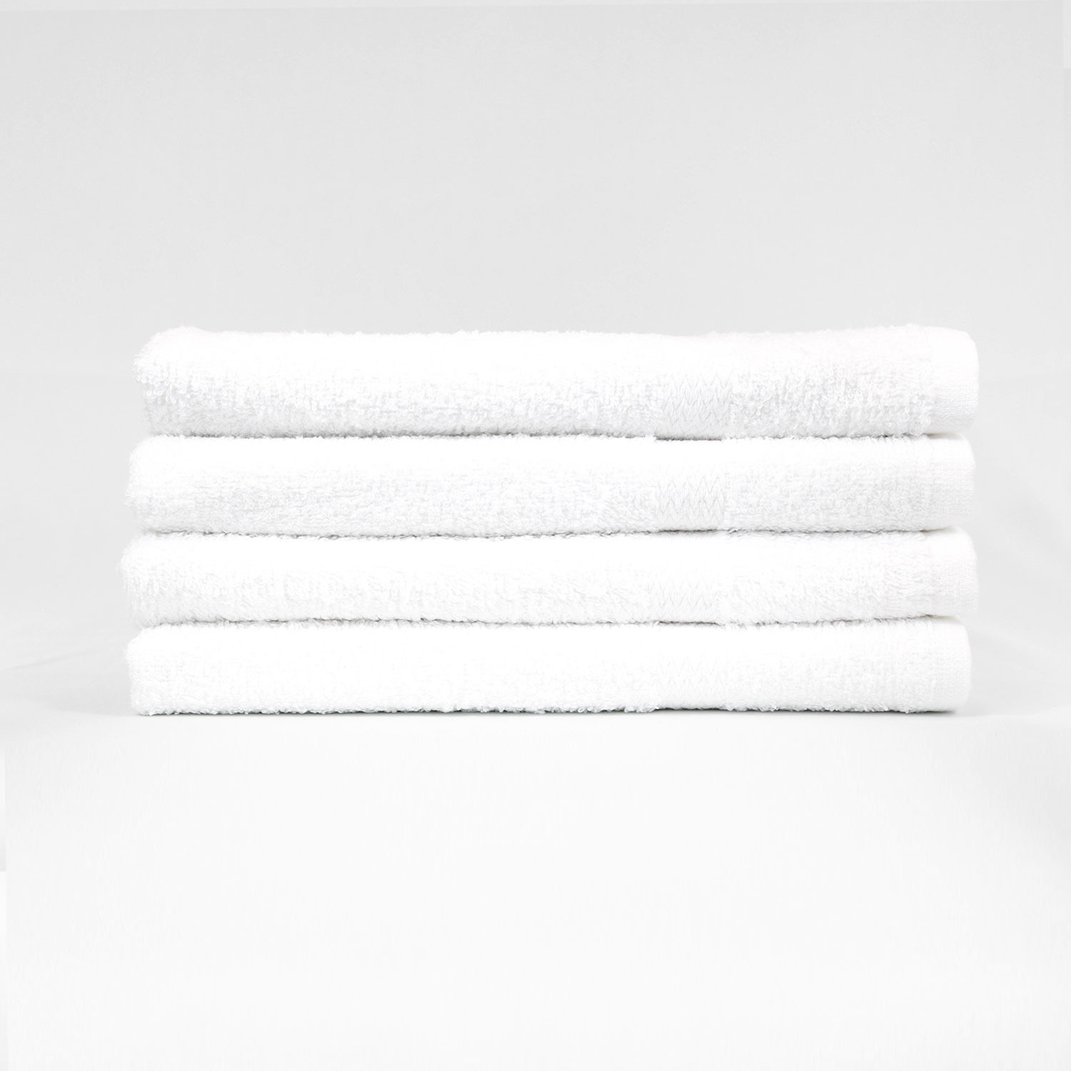 Stack of 22x44 Premium White Gym Towels