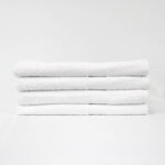 Stack of 24x50 White Bath Towels 10.50lb