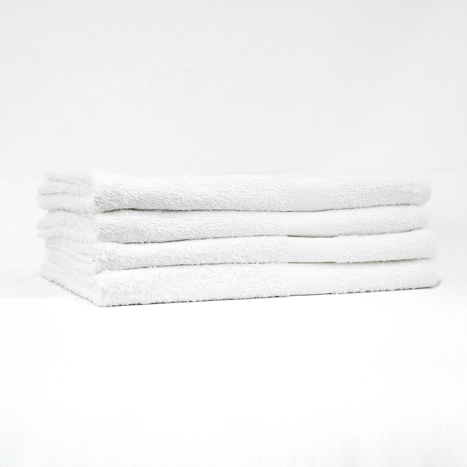 Stack of 24×48 Premium White Gym Towels