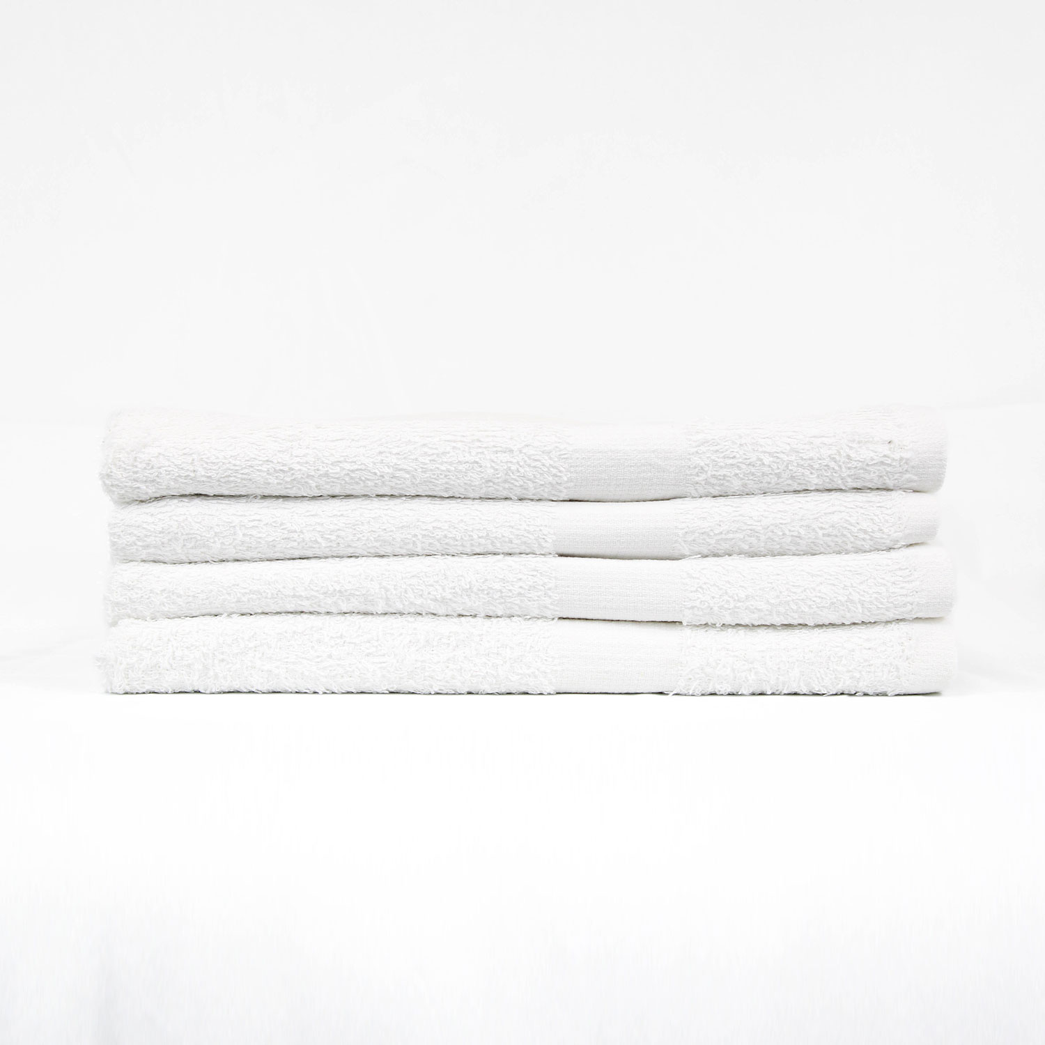 Stack of 24×48 Premium White Gym Towels