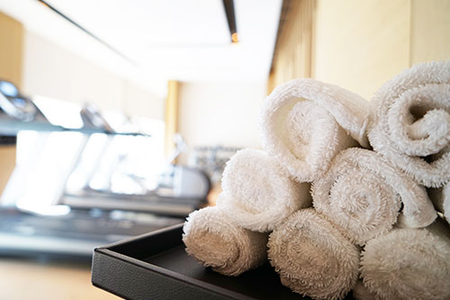 stacked hand towels in gym